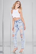 JEANS MOM SLIM CON DESTRUCCIONES CINTURA SUPER ALTA 9746ACWA (7511941677193)